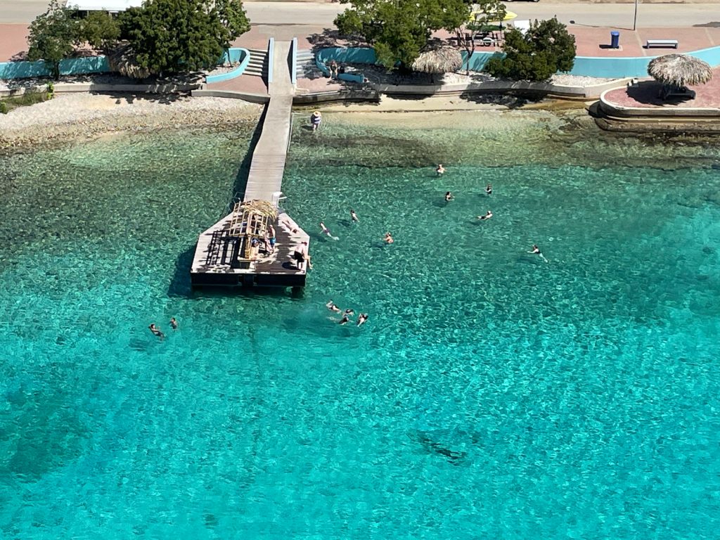 Overhead view of a small swimming pier in Aruba near the cruise port.