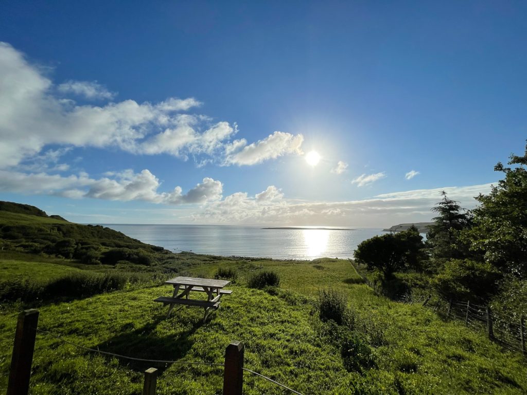 View of the hillside with the ocean in the background on the Isle of Skye.