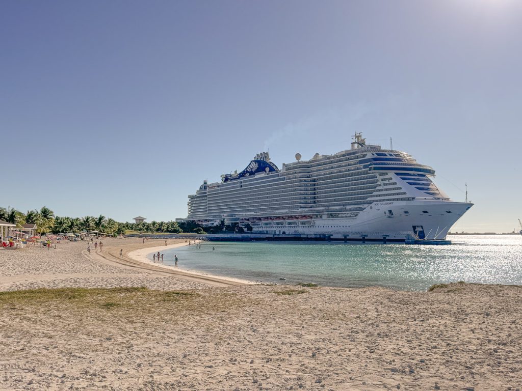 Looking across the beach and turquoise water at MSC's private island Ocean Cay at the MSC Seashore cruise ship.